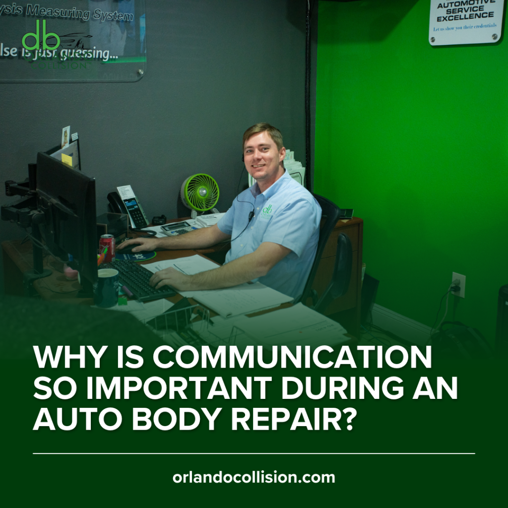 Customer service representative sitting at a desk in an auto body repair office, smiling while working at a computer; on-image text asks why communication is important during an auto body repair.